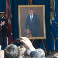 Defense Secretary Ash Carter helps unveil the official portrait of Leon Panetta