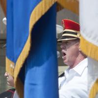 U.S. Army band singer sings National Anthem