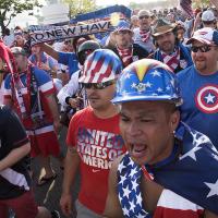 A group of American Outlaws getting ready to parade into a USMNT game