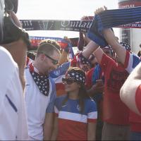 A group of American Outlaws getting ready to parade into a USMNT game