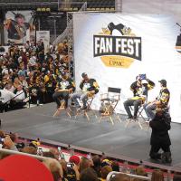 Marc-Andre Fleury tries to help Sidney Crosby guess the word on his head at a Penguin's Fan Fest event