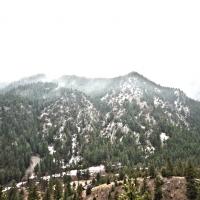 Cheyenne Mountain near the Rocky Mountains with snow and fog